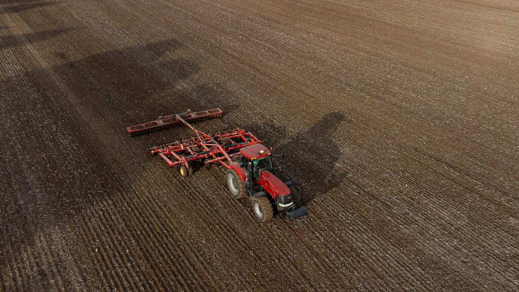 A tractor moving across a field